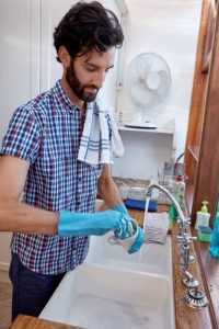 Men cleaning the dishes
